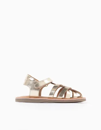 Leather fisherman sandals with crossed straps for baby girls, golden