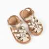 Leather fisherman sandals with crossed straps for baby girls, golden