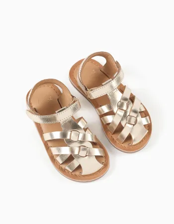 Leather fisherman sandals with crossed straps for baby girls, golden