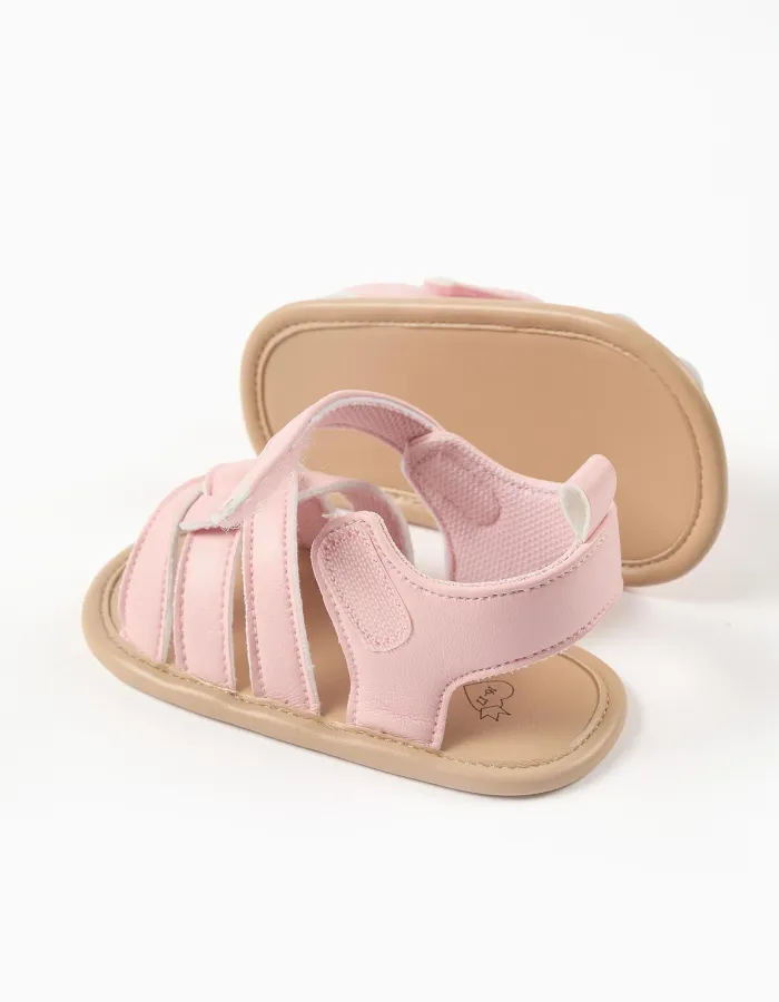 Sandals with open toe and crossed straps for newborn girls, light pink