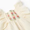 Top with ruffled sleeves and embroidery for baby girls, light beige
