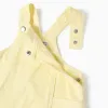 Twill pinafore dress with pockets for baby girls, light yellow
